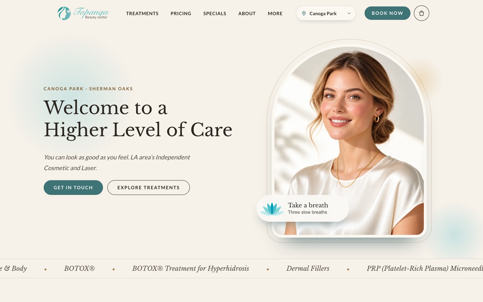 Topanga Beauty Center redesign homepage with an arched portrait, serif headline and treatment ticker on a cream background