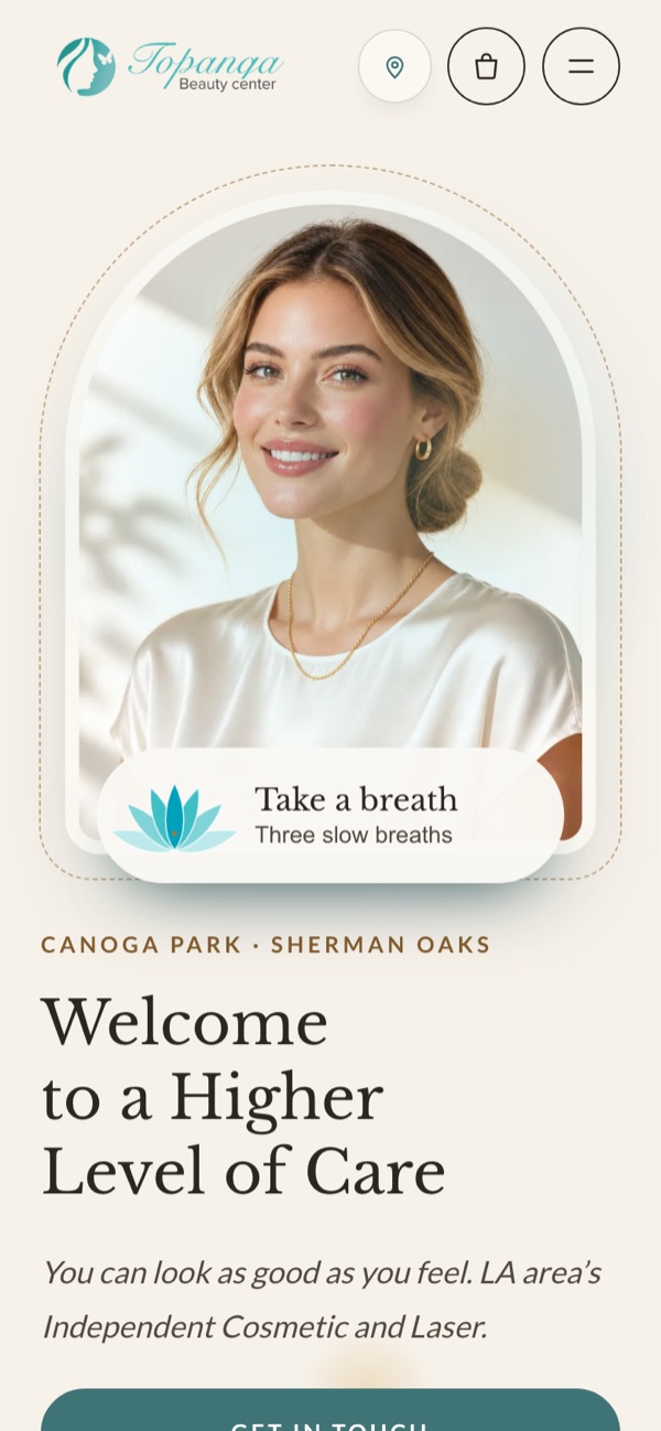 Topanga Beauty Center redesign homepage on a phone, with the arched portrait above the headline